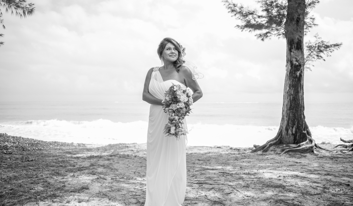 the bride in black nd white beach wedding in Hawaii