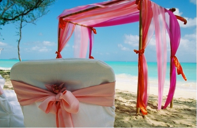 rainbow color material on the beach wedding