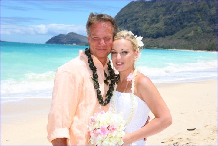 Angela with a family member on the beach