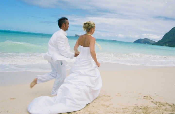 Chris chasing Angela along the shore