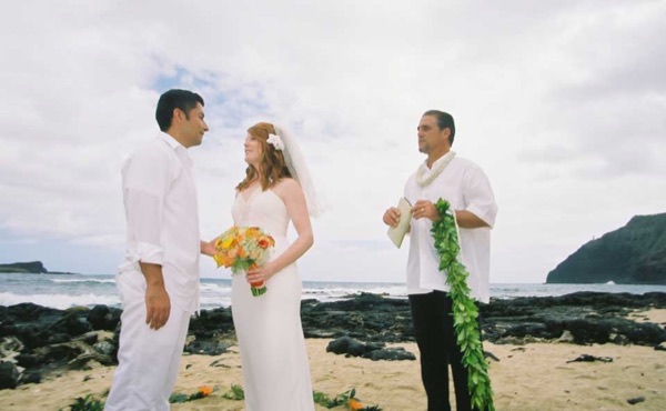 The aisle of orange flowers by the sea, side by side