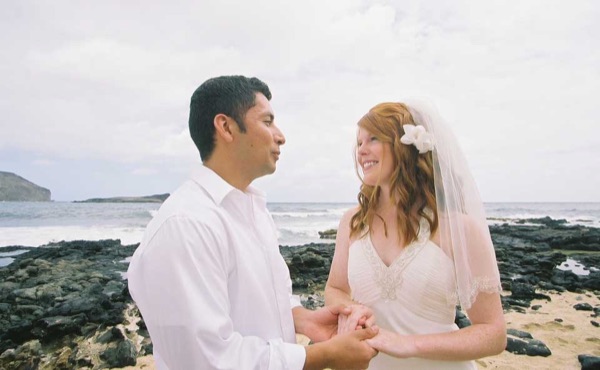 The aisle of orange flowers by the sea, in a happy moment