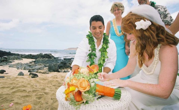 Ashley's wedding ceremony on the beach, close together