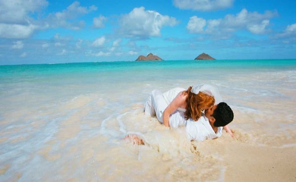 Going into the water for Ashley's trash the dress shoot, side by side