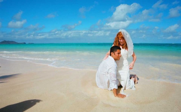 Going into the water for Ashley's trash the dress shoot, in a happy moment