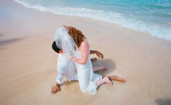 Going into the water for Ashley's trash the dress shoot, wide view