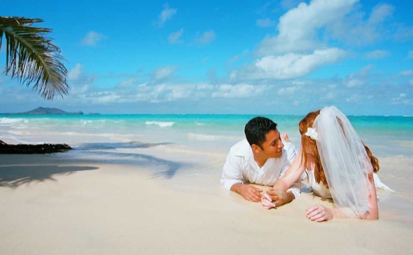 Legs on the beach of love with Ashley and her groom