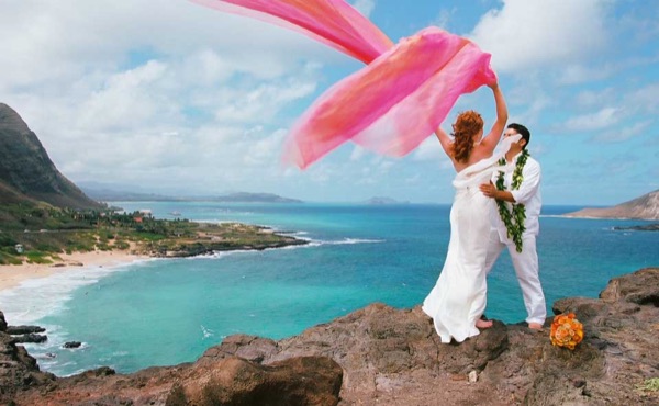 Ashley on the Makapuu cliffs after her wedding, smiling