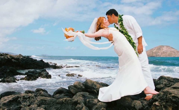 Ashley on the Makapuu cliffs after her wedding, side by side