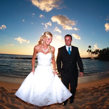 Holly and Matt on the beach at sunset at Paradise Cove