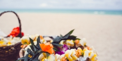 table on the beach with wedding suply