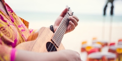 playign the ukulele
