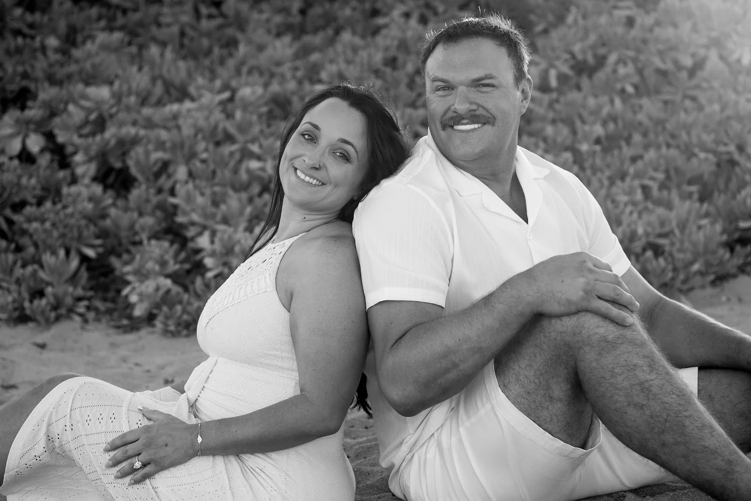 A black and white photo on the sand