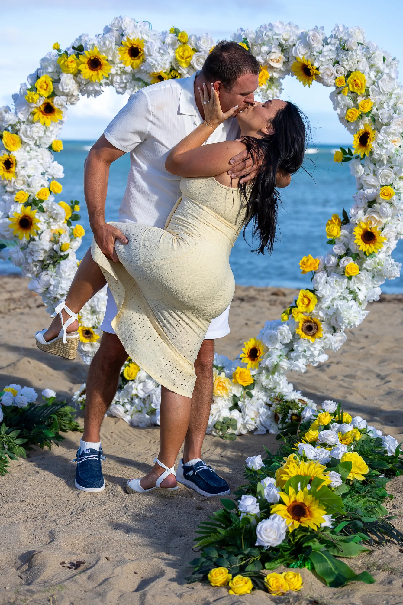 A dip kiss in the sunflower heart