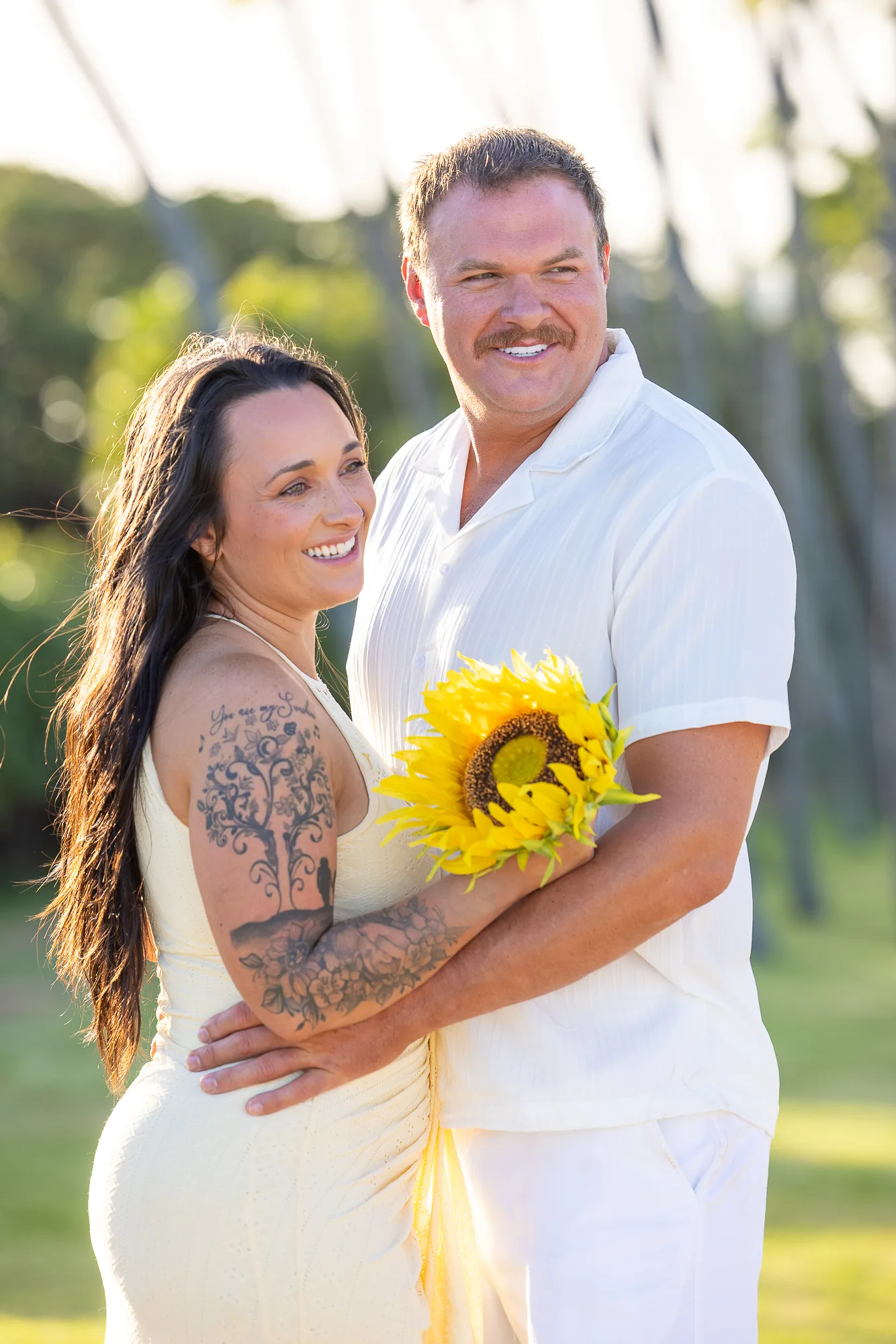 In the golden light with a sunflower