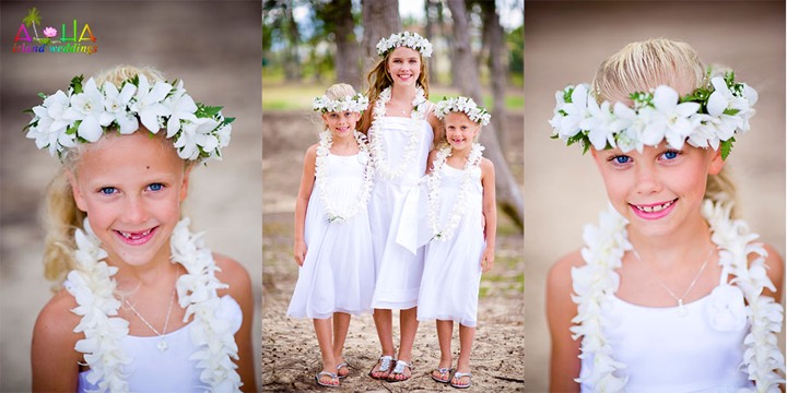 Children in white orchid haku leis at a Waimanalo beach wedding