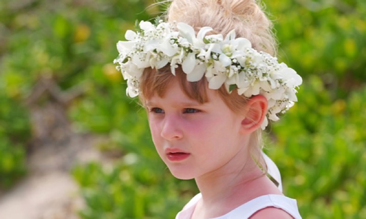 White orchid haku lei for a flower girl