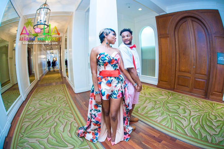 Vow renewal couple in leis in the halls of the Moana Surfrider in Waikiki