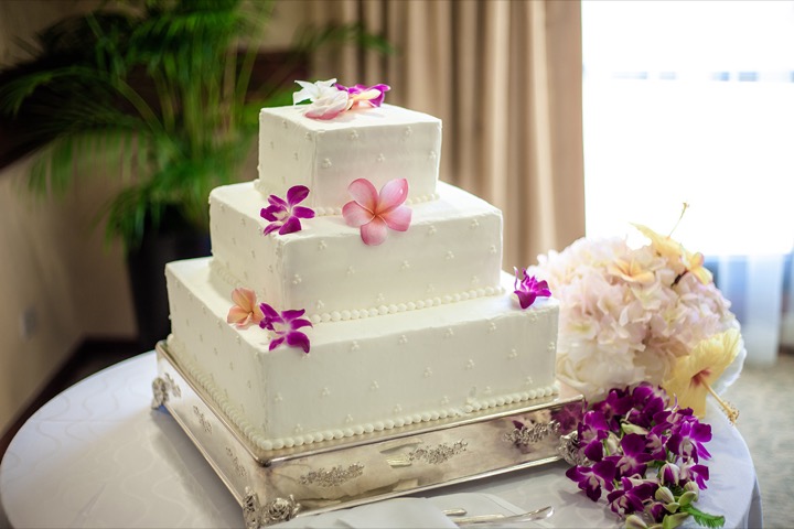 Byrons and Rie wedding cake made with coconut and passion orange flavor
