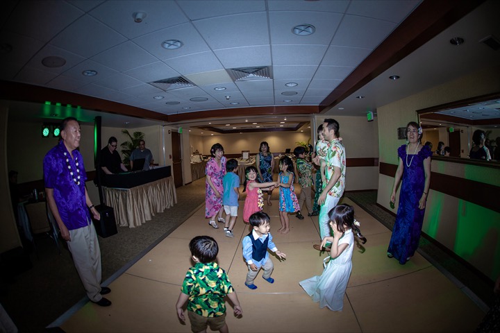 Kids dancing and playing at the reception to music played by the DJ