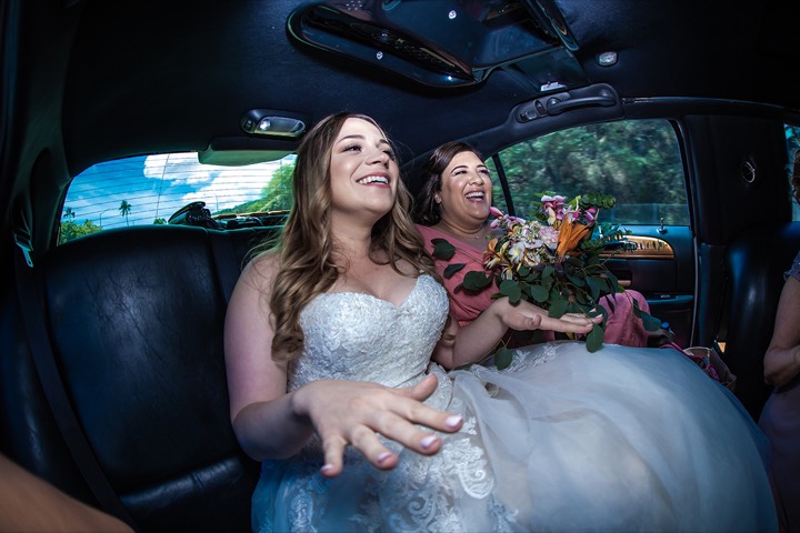 Lauren in the limo leaving the Hilton Hawaiian Village for her beach wedding