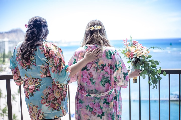 Lauren and her best friend on the lanai of the Rainbow Tower at the Hilton Hawaiian Village