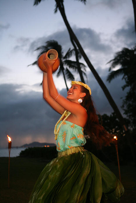 playing the ipu as Kavena dances the hula
