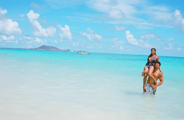 Jamillah and Brandon at Lanikai beach, close together