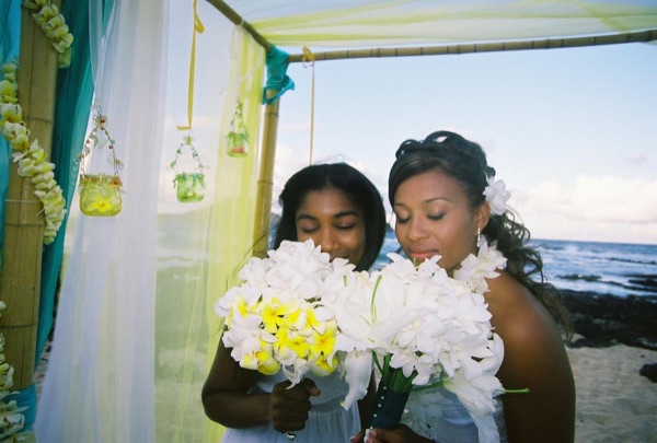 Jamillah with her bridesmaids, smiling