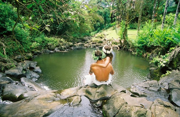 Jamillah deep in the jungle of Oahu, laughing together