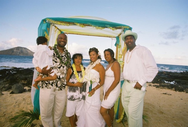 Family and friends with Jamillah and Brandon, laughing together