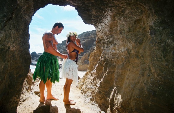 Jamillah and Brandon in a lava tube cave by the beach, from another angle