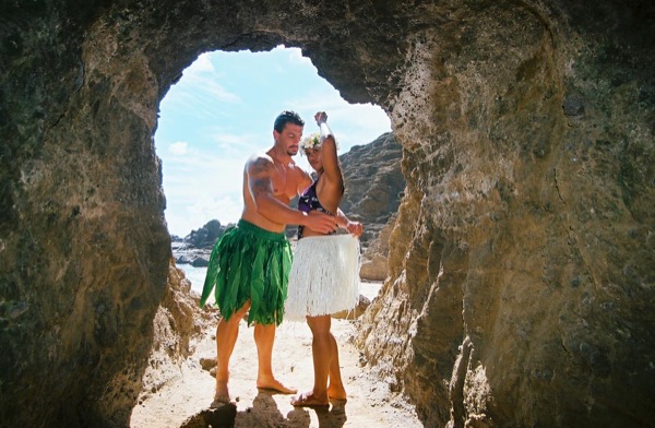 Jamillah and Brandon in a lava tube cave by the beach, close up