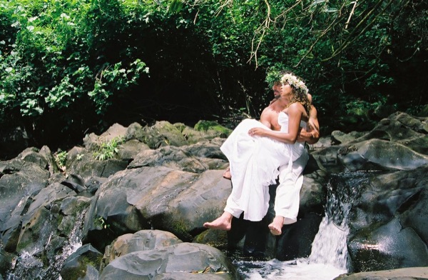 Jamillah and Brandon in the Nuuanu rainforest, laughing together