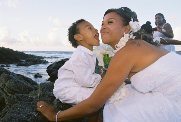 Jamillah sharing a kiss on the rocks