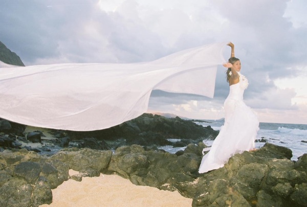 Jamillah and Brandon at the gazebo by the sea
