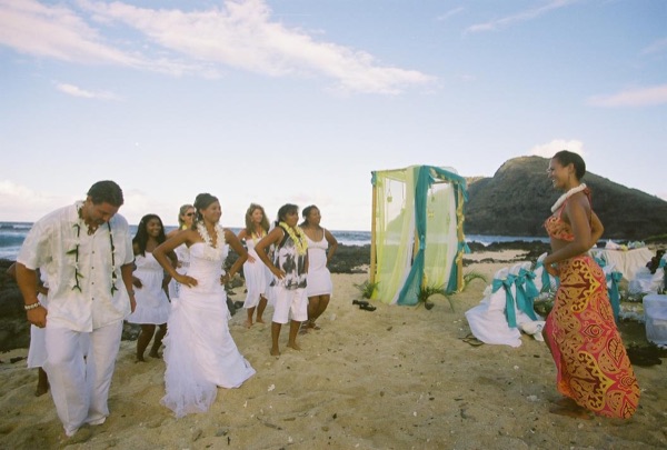 Guests learning the hula with dancer Keveca, close up