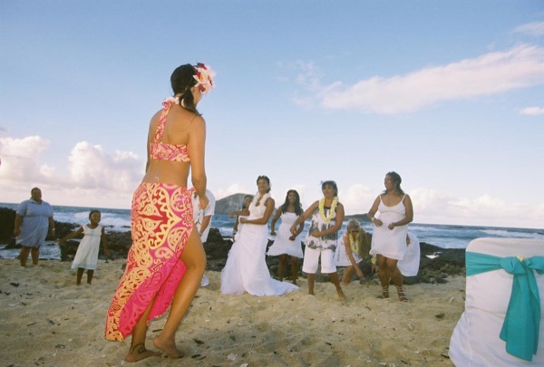 Guests learning the hula with dancer Keveca, in the sunshine