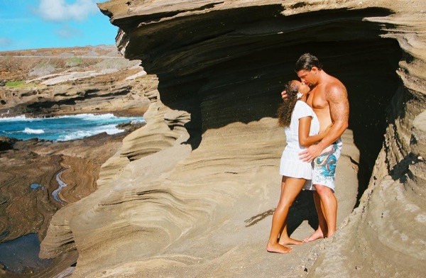 Jamillah and Brandon on the east coast cliffs above the Pacific, in a happy moment
