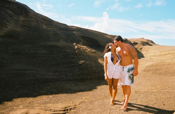 Jamillah and Brandon on the east coast cliffs above the Pacific, close together