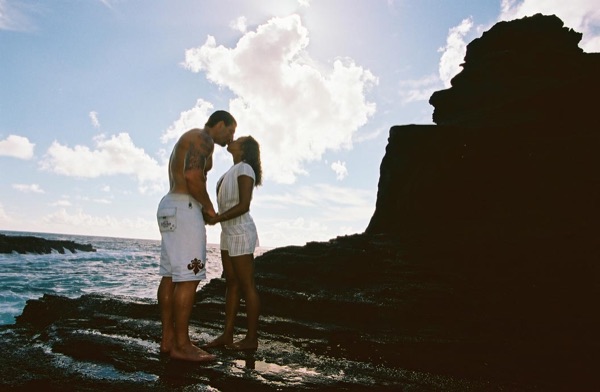 Jamillah and Brandon on the east coast cliffs above the Pacific, in the bright sun