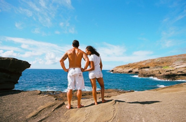 Jamillah and Brandon on the east coast cliffs above the Pacific, with a big smile