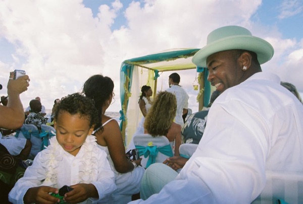 Jamillah and Brandon's turquoise themed beach ceremony, side by side