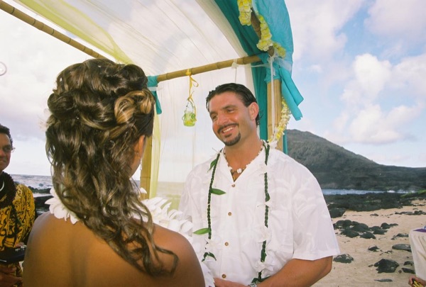 Jamillah and Brandon's turquoise themed beach ceremony, on the sand