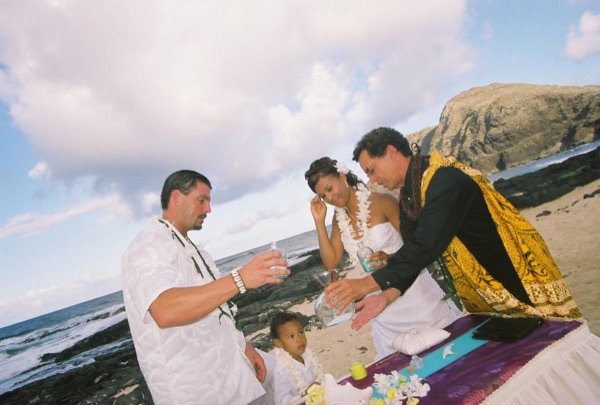 Jamillah and Brandon's turquoise themed beach ceremony, in the afternoon light