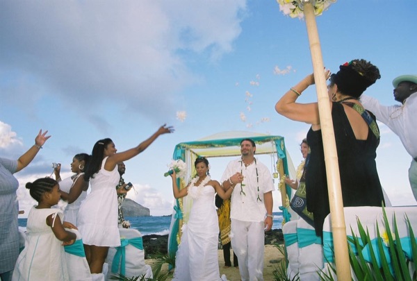 Jamillah and Brandon's turquoise themed beach ceremony, in the breeze
