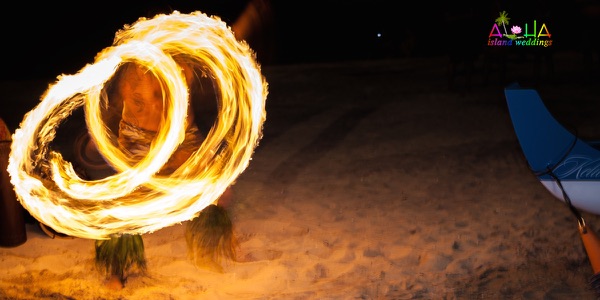 A fire knife dancer at the reception, a different view