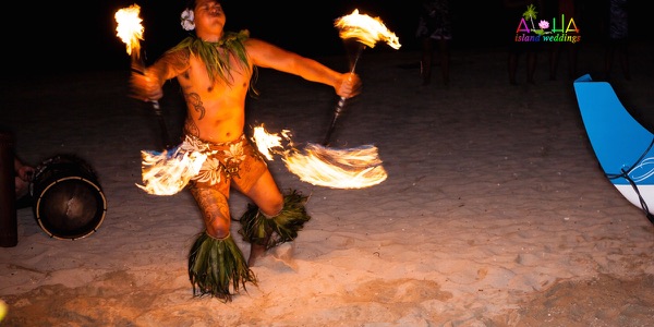 A fire knife dancer at the reception, one more moment