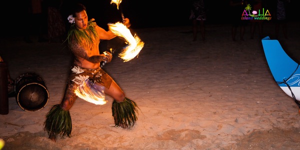 A Tahitian dancer performing for the guests, one more moment
