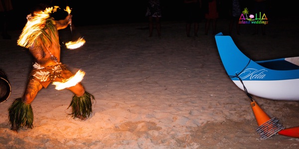 A fire knife dancer at the reception, another view